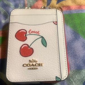 Small coach clutch wallet